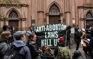 Abortion-rights activists gather outside of a Catholic church in downtown Manhattan to voice their support for a woman's right to choose on May 07, 2022 in New York City. The protests at the Basilica of St. Patricks Old Cathedral, which have been occurring weekly and where a small number of pro-life activists worship, have been given added urgency by the recent leaked Supreme Court ruling on Roe v. Wade. Stephanie Keith/Getty Images