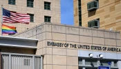 U.S. national and rainbow flags are pictured on the U.S. embassy in Moscow on June 30, 2022.