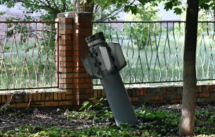 A photograph taken on July 3, 2022 shows an tail section of a 300mm rocket which appear to contained cluster bombs launched from a BM-30 Smerch multiple rocket launcher embedded in the ground after shelling in Kramatorsk, amid the Russian invasion of Ukraine. Getty Images