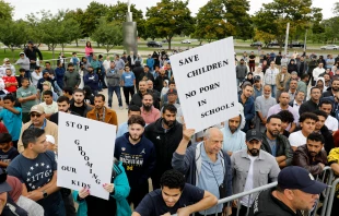 Demonstrators who support keeping inappropriate books out of libraries gather during a protest outside of the Henry Ford Centennial Library in Dearborn, Michigan, on Sept. 25, 2022. Credit: JEFF KOWALSKY/AFP via Getty Images