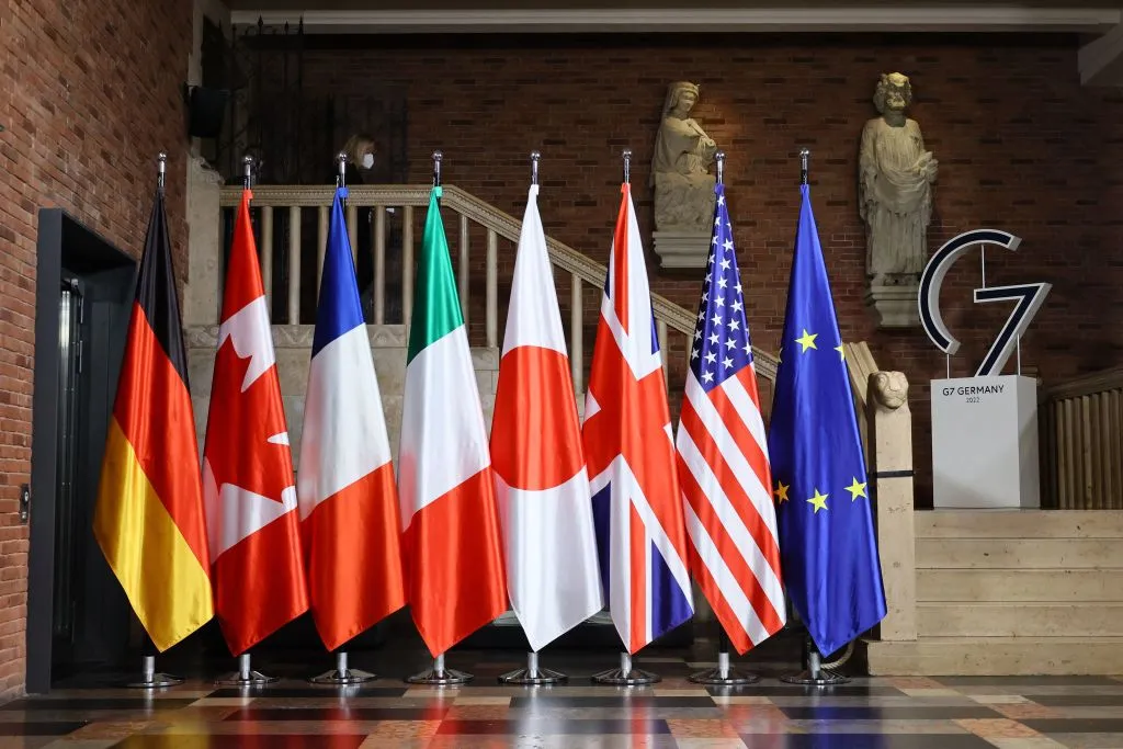 Flags of (left to right) Germany, Canada, France, Italy, Japan, Great Britain, USA, and Europe are displayed for a G7 Foreign Ministers Meeting at the City Hall in Muenster, western Germany on Nov. 3, 2022.?w=200&h=150