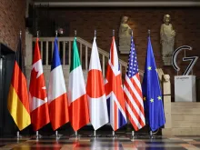 Flags of (left to right) Germany, Canada, France, Italy, Japan, Great Britain, USA, and Europe are displayed for a G7 Foreign Ministers Meeting at the City Hall in Muenster, western Germany on Nov. 3, 2022.