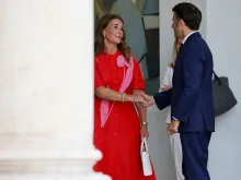 Melinda French Gates shakes hands with French President Emmanuel Macron after a meeting at the Elysee Palace on June 23, 2023.