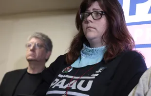 Pro-life activist Lauren Handy listens during a news conference on the five fetuses found inside the home where she and other anti-abortion activists were living on Capitol Hill at a news conference at the Hyatt Regency on April 5, 2022, in Washington, D.C. Credit: Anna Moneymaker/Getty Images