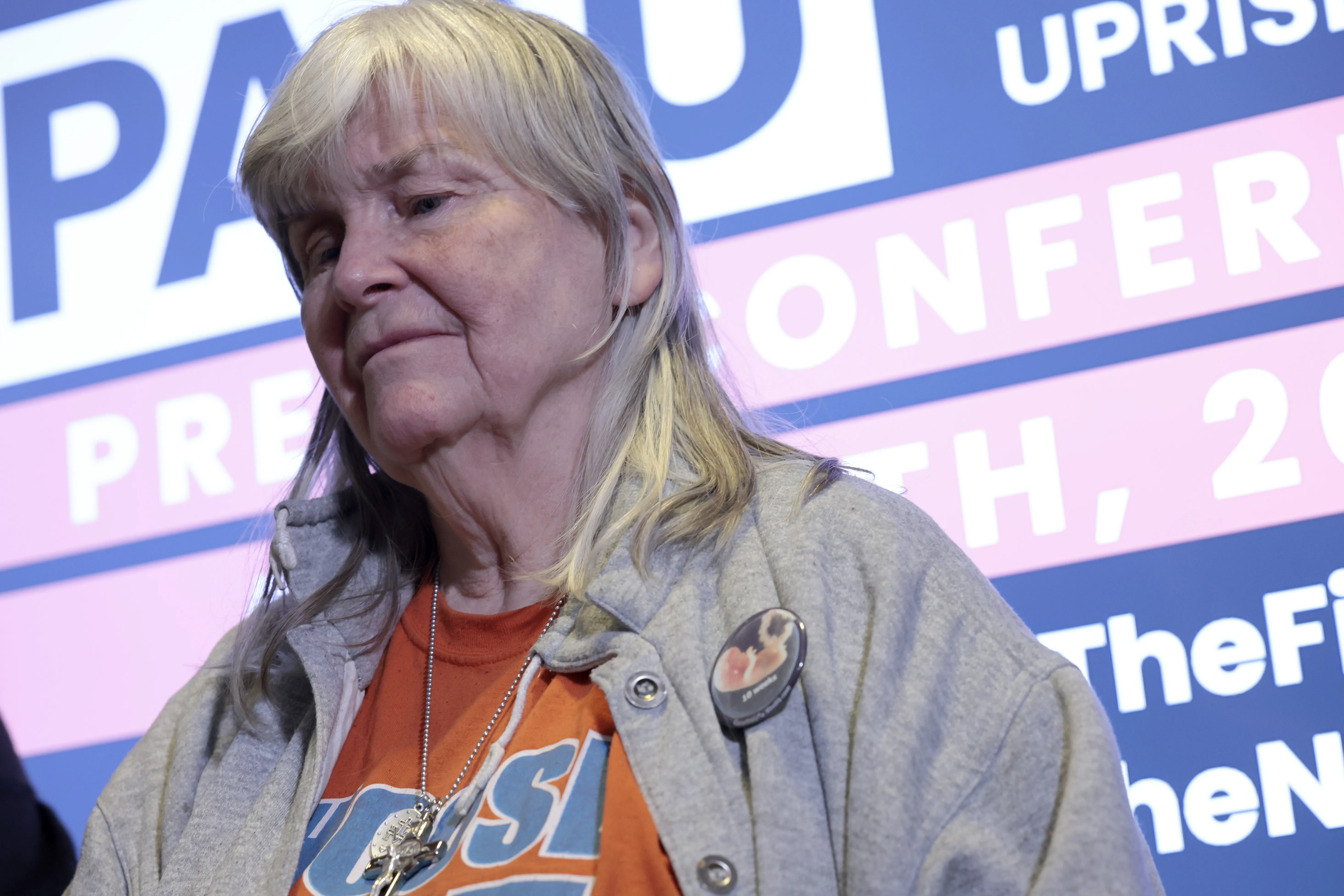 Pro-life activist Joan Andrews Bell listens during a news conference on the five fetuses found inside the home where she and other anti-abortion activists were living on Capitol Hill at a news conference at the Hyatt Regency on April 5, 2022, in Washington, D.C.?w=200&h=150