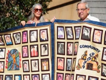 Abuse victims and their supporters hold quilts bearing portraits of abused children while gathered outside the Cathedral of Our Lady of the Angels in Los Angeles on Feb. 1, 2013, one day after the release of personnel files of priests accused of sexual misconduct.