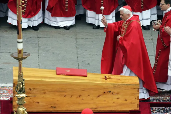 Cardinal Joseph Ratzinger blesses the coffin of Pope John Paul II during his funeral mass in St. Peter's Square at the Vatican City April 8, 2005. Photo by PATRICK HERTZOG/AFP via Getty Images