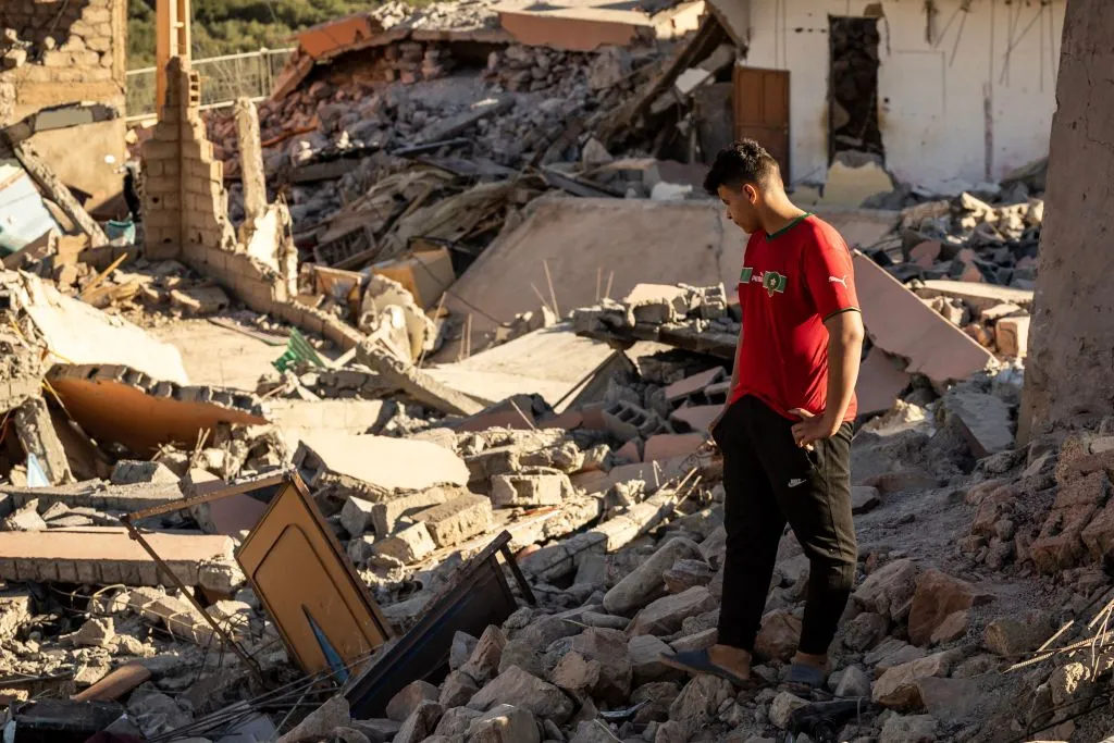 A man looks at the rubble of homes in the village of Talat N’Yaaqoub south of Marrakech in Morocco on Sept. 11, 2023. The quake that struck the country on Sept. 8 killed at least 2,122 people, injured more than 2,400 others, and flattened entire villages.?w=200&h=150