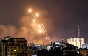 A salvo of rockets is fired by Palestinian militants from Gaza City toward Israel on Oct. 8, 2023. The death toll surged to almost 1,000 since Palestinian militant group Hamas launched its massive surprise attack on Israel with a barrage of rockets and a massive ground assault, officials on both sides said on Oct. 8. Credit: MOHAMMED ABED/AFP via Getty Images