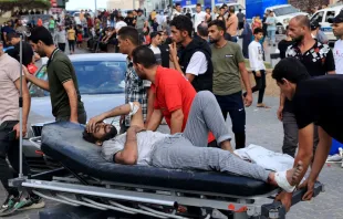 A Palestinian man injured during an air strike is wheeled into the Nasser hospital in Khan Yunis on the southern Gaza Strip on Oct. 17, 2023. Credit: SAID KHATIB/AFP via Getty Images