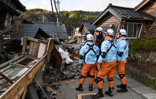 Firefighters inspect collapsed wooden houses in Wajima, Ishikawa Prefecture, on Jan. 2, 2024, a day after a major 7.6-magnitude earthquake struck the Noto region in Ishikawa Prefecture. Credit: KAZUHIRO NOGI/AFP via Getty Images