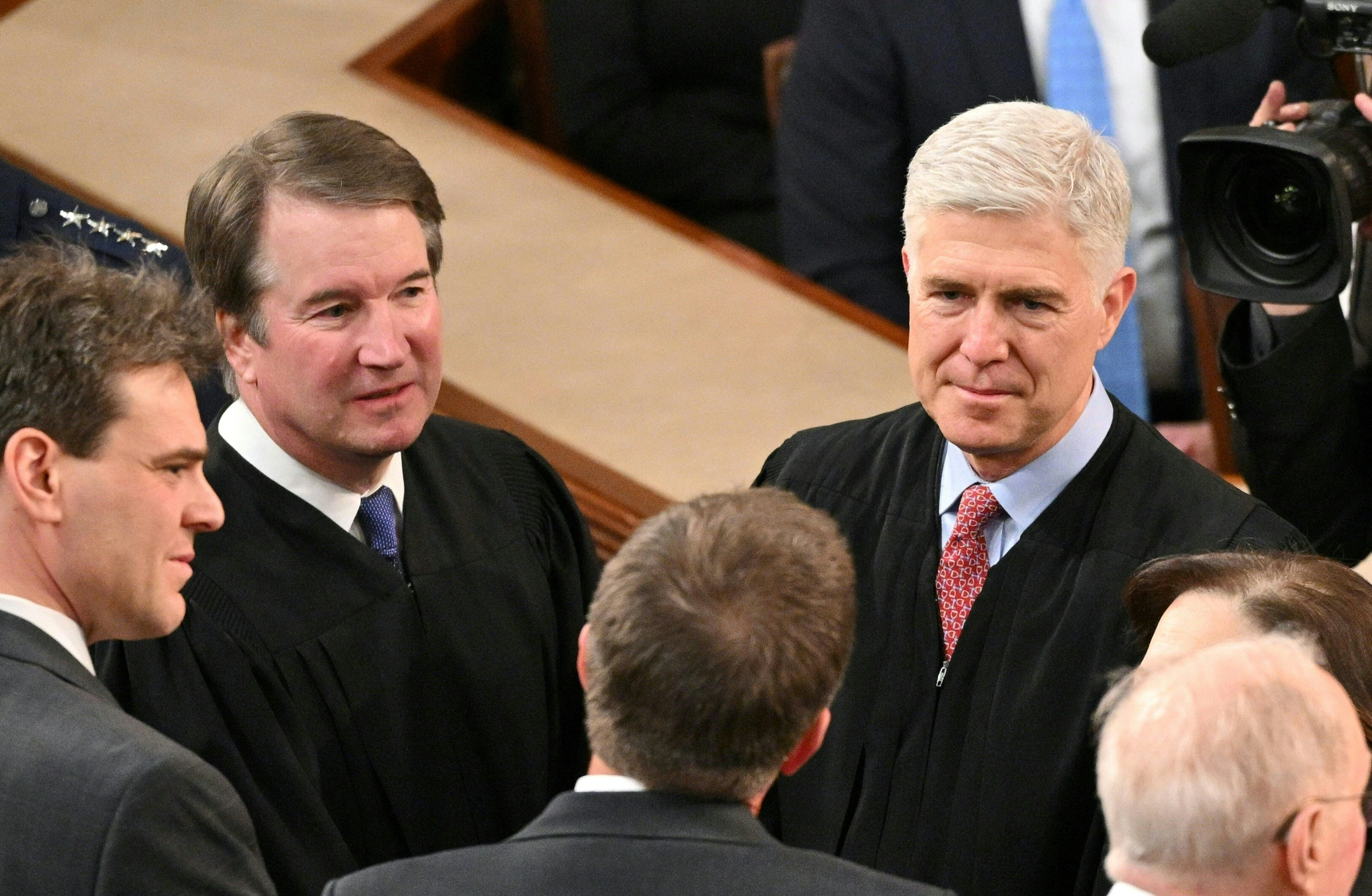 U.S. Supreme Court Associate Justices Brett Kavanaugh (left) and Neil Gorsuch (right) arrive for President Joe Biden’s State of the Union address in the House Chamber of the U.S. Capitol in Washington, D.C., on March 7, 2024.?w=200&h=150