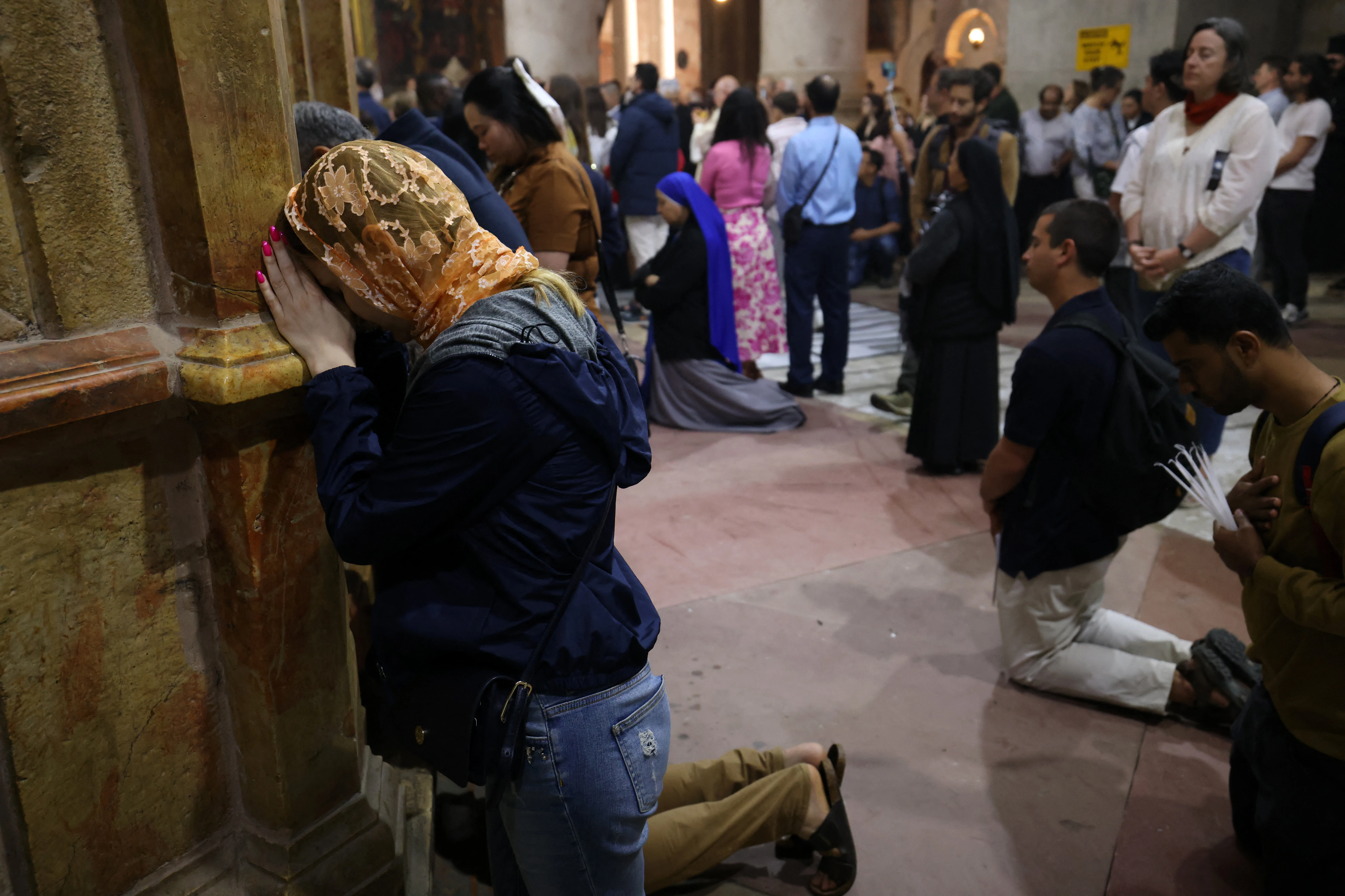 Christian worshippers pray at the Church of the Holy Sepulchre in the Old City of Jerusalem on Easter Sunday, March 31, 2024.?w=200&h=150