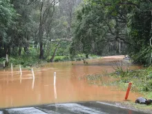 A flooded road is seen in the village of Tintenbar after heavy rain on April 5, 2024, in Ballina, Australia.
