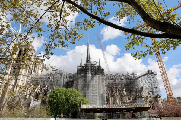 Notre-Dame de Paris Cathedral and its new spire are seen almost five years after a fire ravaged the emblematic monument on April 10, 2024, in Paris. On April 15, 2019, a fire broke out in the heart of Notre-Dame de Paris. For about 15 hours, firefighters fought against the flames that ravaged this historic monument in the French capital. Almost five years later, the last stages of securing continue. The securing of the building, between the stabilization of the structure, the replacement of stones, and the solidification of the vaults, will have cost 165 million euros (about $179 million). Credit: Chesnot/Getty Images