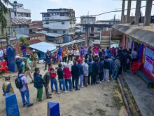 People visit a polling station to cast their vote during the second phase of voting on April 26, 2024, in a village in Ukhrul district, Manipur, India.
