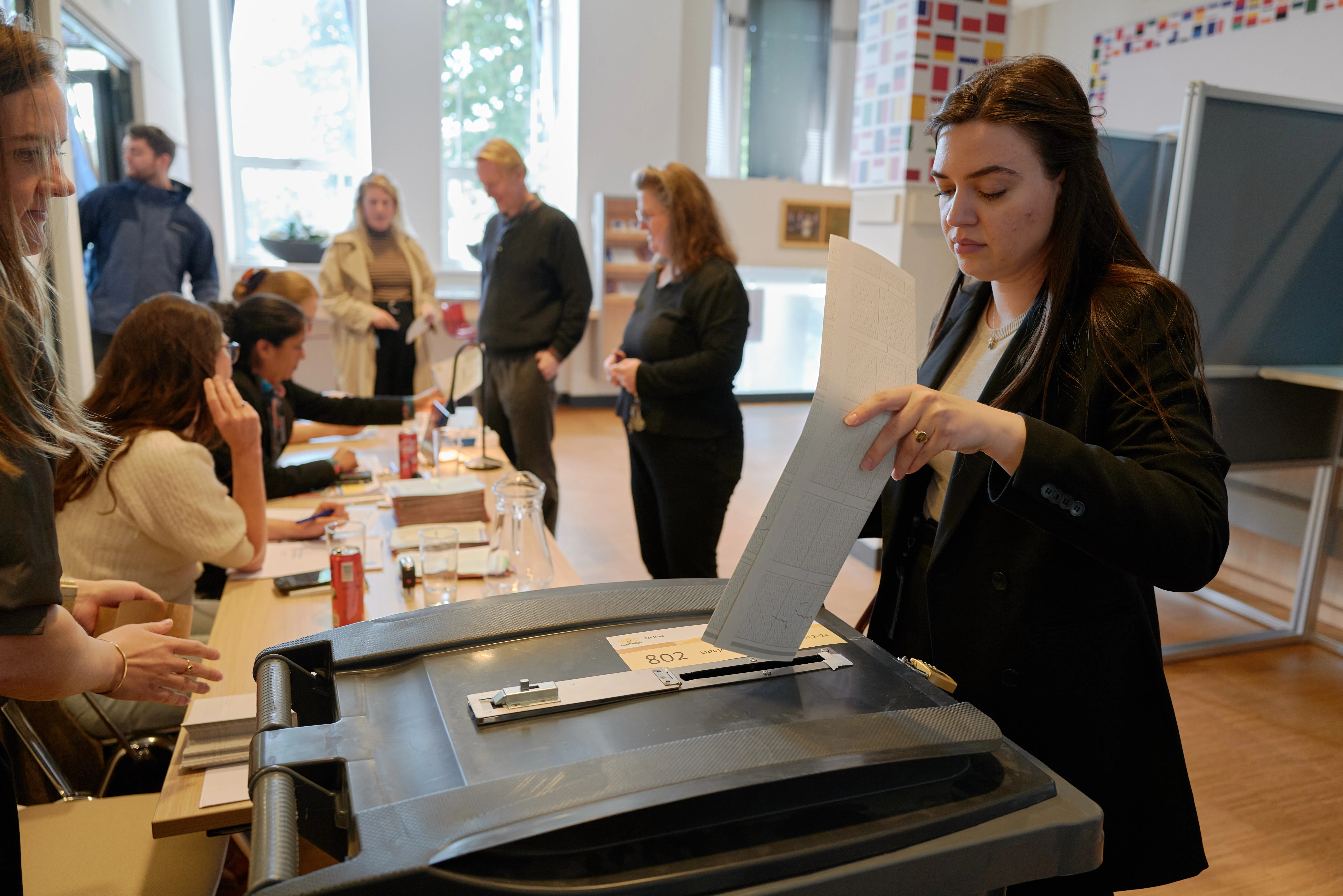 People cast their ballot in a polling station on June 6, 2024, in The Hague, Netherlands. Voters in 27 European Union countries go to the polls over the next four days to elect members of the European Parliament.?w=200&h=150