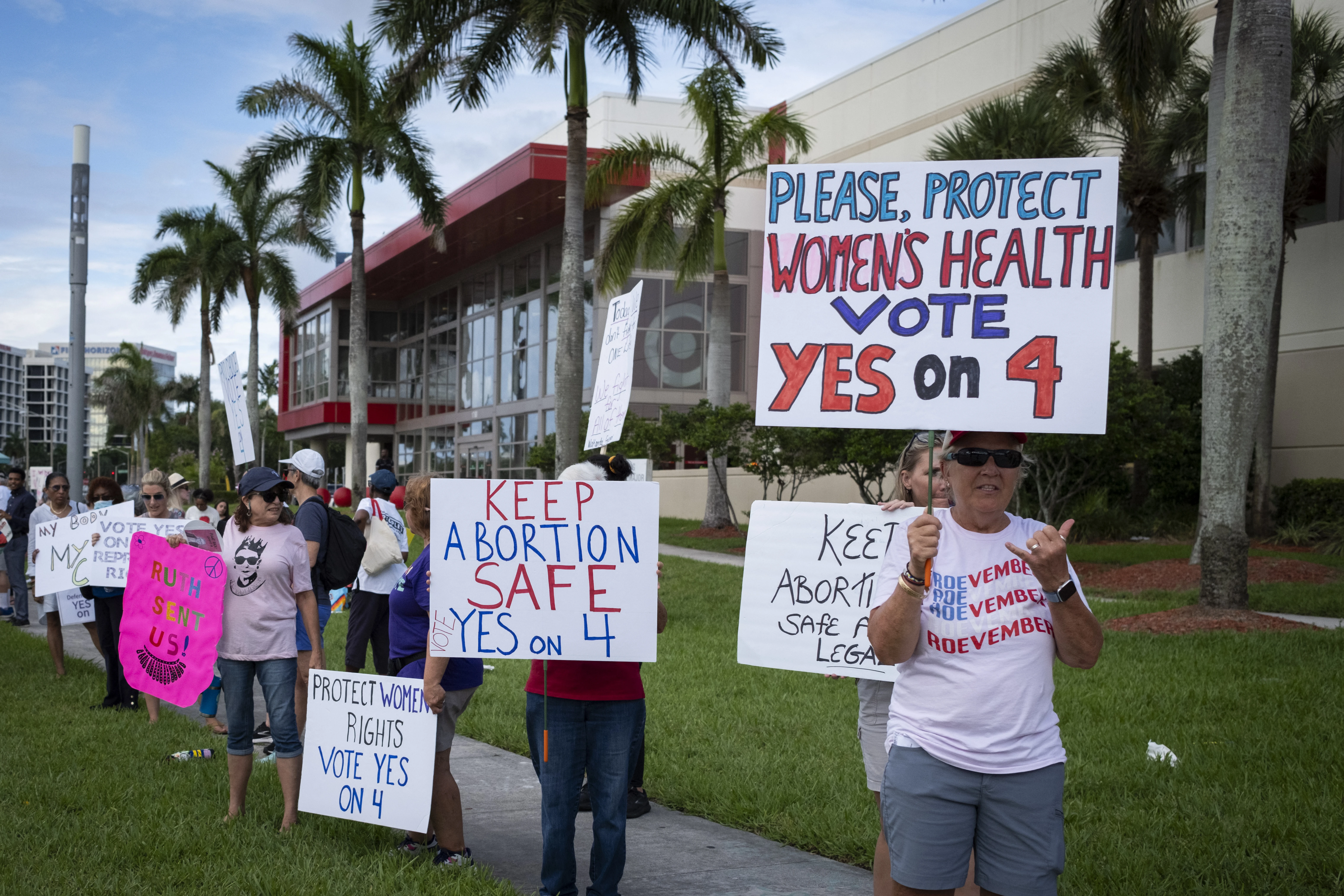 People hold up signs during a pro-abortion rally on the second anniversary of the Supreme Court ruling to overturn Roe v. Wade in West Palm Beach, Florida, on June 24, 2024.?w=200&h=150