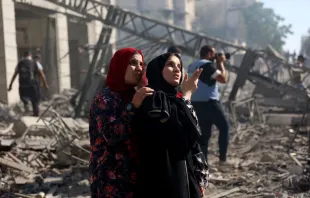 Palestinian women react as they look at the badly damaged Latin Patriarchate Holy Family School after it was reportedly hit during Israeli military bombardment in Gaza City on July 7, 2024, amid the ongoing conflict in the Palestinian territory between Israel and Hamas. Credit: Omar AL-QATTAA/AFP via Getty Images