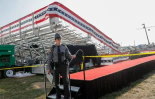 Law enforcement agents stand near the stage of a campaign rally for Republican presidential candidate Donald Trump on July 13, 2024, in Butler, Pennsylvania, after an assassination attempt on the former president. Credit: Anna Moneymaker/Getty Images