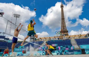 Norwegian players Christian Sorum (L), Anders Mol (2ndL) and Australian players Zachery Schubert (2ndR) and Thomas Hodges (R) take part in a practice session ahead of the opening of the Paris 2024 Olympic Games at the Eiffel Tower Stadium in Paris on July 24, 2024. Credit: ODD ANDERSEN/AFP via Getty Images