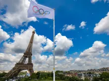 The Olympic flag flutters during a practice session at Eiffel Tower Stadium in Paris on July 24, 2024, ahead of the Paris 2024 Olympic Games.