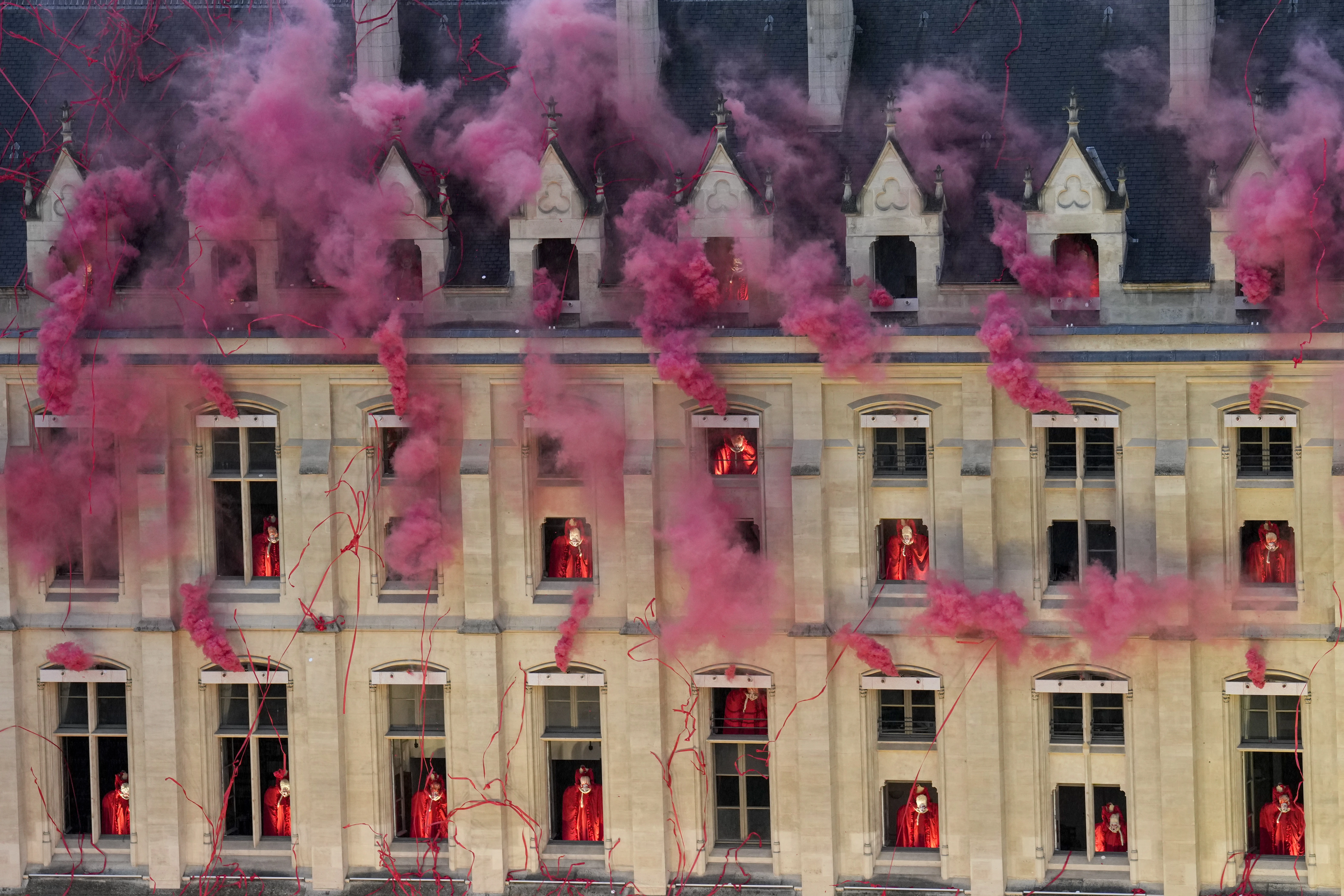 Smoke billows near windows as performers participate in the opening ceremony of the 2024 Olympic Games in Paris on July 26, 2024.?w=200&h=150