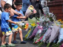 Tributes to the victims are left by well-wishers on July 30, 2024, in Southport, England. A teenager armed with a knife attacked children at a Taylor Swift-themed holiday club in Hart Lane, Southport.