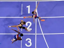 U.S. Olympian Cole Hocker crosses the finish line to win the men’s 1,500-meter final at Stade de France in Saint-Denis, north of Paris, on Aug. 6, 2024.