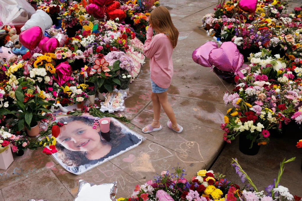 Members of the community arrive ahead of a vigil to remember the victims of last week’s knife attack near the Atkinson on Aug. 5, 2024, in Southport, England.?w=200&h=150