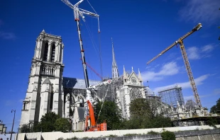 During the Olympics, track and field athletes rang the bronze bell at the Saint-Denis’ Stade de France and now that same bill will ring during Masses when Notre Dame Cathedral reopens this December. Credit: MAGALI COHEN/Hans Lucas/AFP via Getty Images