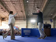 Democratic presidential candidate, U.S. Vice President Kamala Harris and Democratic vice presidential candidate Minnesota Gov. Tim Walz appear on stage together during a campaign event on Aug. 7, 2024, in Detroit.