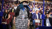 A pro-abortion attendee stands during the first day of the Democratic National Convention at the United Center on Aug. 19, 2024, in Chicago.