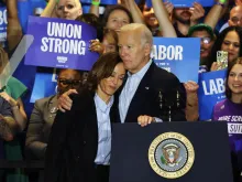 Vice President Kamala Harris is embraced by President Joe Biden, who described her as having "the moral compass of a saint" during a campaign event in Pittsburgh on Sept. 2, 2024.