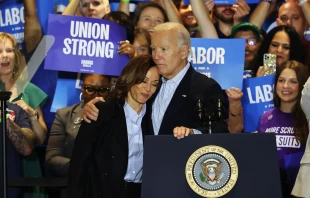 Vice President Kamala Harris is embraced by President Joe Biden, who described her as having "the moral compass of a saint" during a campaign event in Pittsburgh on Sept. 2, 2024. Credit: Michael M. Santiago/Getty Images