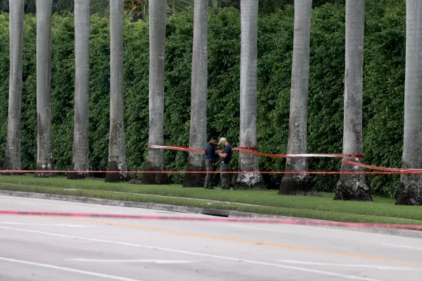 Law enforcement personnel investigate the area around Trump International Golf Club after an apparent assassination attempt of former President Donald Trump on Sept. 15, 2024, in West Palm Beach, Florida. Credit: Joe Raedle/Getty Image