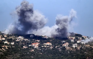 A cloud of smoke erupts during an Israeli air strike on the village of Sujud in southern Lebanon on Sept. 25, 2024. Israel announced dozens of new air strikes on Hezbollah strongholds in Lebanon on Sept. 24, a day after 492 people, including 35 children, were killed in the deadliest bombardment since a devastating war in 2006. Credit: RABIH DAHER/AFP via Getty Images