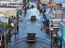 Floodwaters inundate the main street in Tarpon Springs, Florida, after Hurricane Helene passed offshore on Sept. 27, 2024. Hurricane Helene made landfall Thursday night in Florida’s Big Bend with winds up to 140 mph and storm surges.