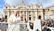 Pope Francis greets the crowd at the end of a Mass for the opening of the 16th Ordinary General Assembly of the Synod of Bishops, Wednesday, Oct. 2, 2024, in St Peter's Square.