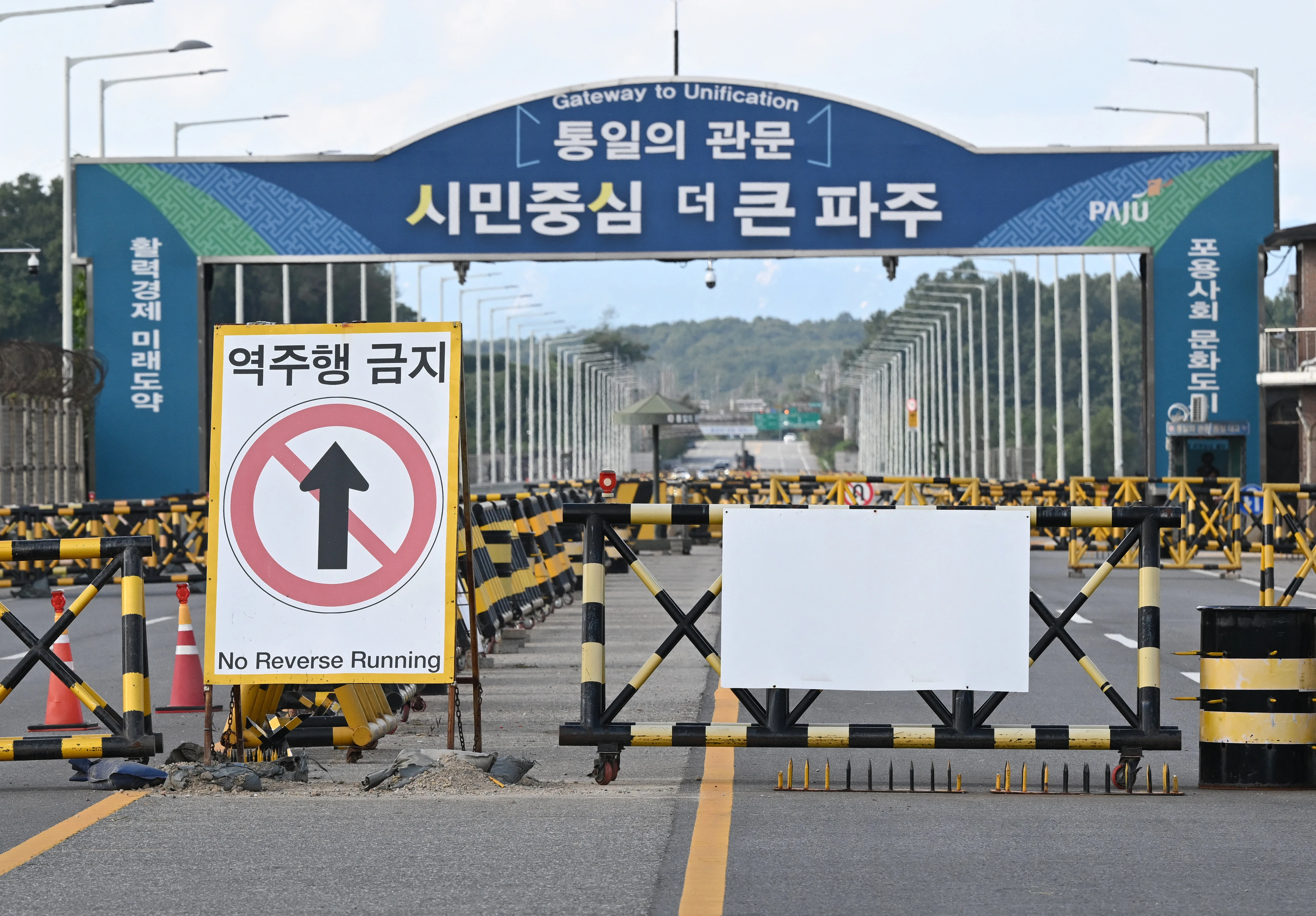 Barricades are set up at a military checkpoint on the Tongil bridge, the road leading to North Korea’s Kaesong city, in the border city of Paju on Oct. 9, 2024. North Korea’s army said on Oct. 9 it was moving to “permanently shut off and block the southern border” with Seoul and had informed the U.S. military to prevent an accidental clash.?w=200&h=150