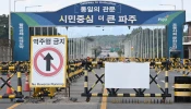 Barricades are set up at a military checkpoint on the Tongil bridge, the road leading to North Korea’s Kaesong city, in the border city of Paju on Oct. 9, 2024. North Korea’s army said on Oct. 9 it was moving to “permanently shut off and block the southern border” with Seoul and had informed the U.S. military to prevent an accidental clash.