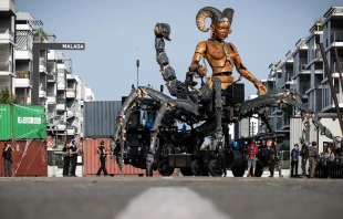 Operators work on Lilith, the “guardian of darkness,” built for the Hellfest metal festival in Toulouse, southwestern France, on Oct. 15, 2024. “Lilith” is one of the characters in the urban opera of the French company La Machine titled “The Guardian of the Temple Opus II: The Portal of Darkness,” which will be presented on Oct. 25–27, 2024, in Toulouse. Credit: LIONEL BONAVENTURE/AFP via Getty Images