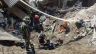 Members of a rescue team search for victims at Klatanlo village in East Flores Regency, East Nusa Tenggara, on Nov. 4, 2024, after Mount Lewotobi Laki-Laki erupted overnight.