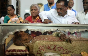 Indian Christians pay their respects to the remains of St. Francis Xavier during the 17th exposition of the saint's body at the Se Cathedral in Goa on Nov. 22, 2014. Credit: PUNIT PARANJPE/AFP via Getty Images