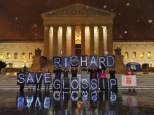 Anti-death penalty activists, including members of MoveOn.org and other advocacy groups, rally outside the U.S. Supreme Court to prevent the execution of Oklahoma inmate Richard Glossip on Sept. 29, 2015, in Washington, D.C.