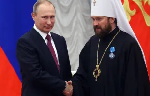 Russian President Vladimir Putin shakes hands with Russian Orthodox Church Bishop Hilarion Alfeyev during a state  ceremony at the Kremlin in Moscow, Russia, on September 22, 2016. Credit: Photo by Mikhail Svetlov/Getty Images
