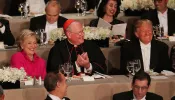 Cardinal Timothy Dolan sits between Hillary Clinton and Donald Trump at the annual Alfred E. Smith Memorial Foundation Dinner at the Waldorf Astoria on Oct. 20, 2016, in New York City.