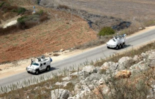 Two vehicles for the Spanish troop within the United Nations Interim Force in Lebanon (UNIFIL) on the tense southern border of the country in August 2024. Credit: Ramiz Dallah/Shutterstock