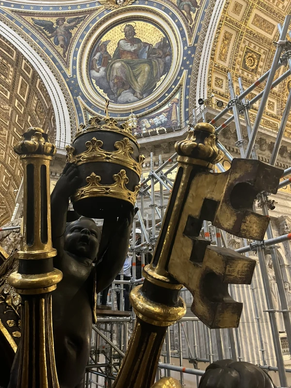 A cherubic figure adorns the baldacchino at St. Peter's Basilica, Tuesday, Oct. 8, 2024. Credit: Courtney Mares/CNA