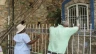 Haitians at prayer before an image of the Blessed Virgin Mary.